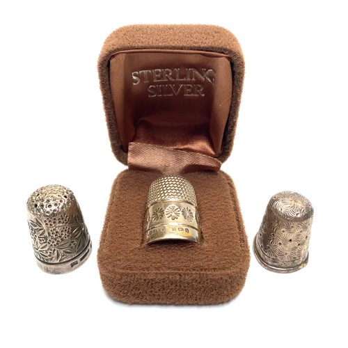 769G - Three sterling silver thimbles.