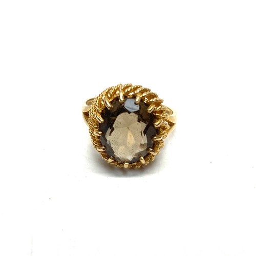 886 - 9ct gold Smokey Quartz/topaz cocktail ring.