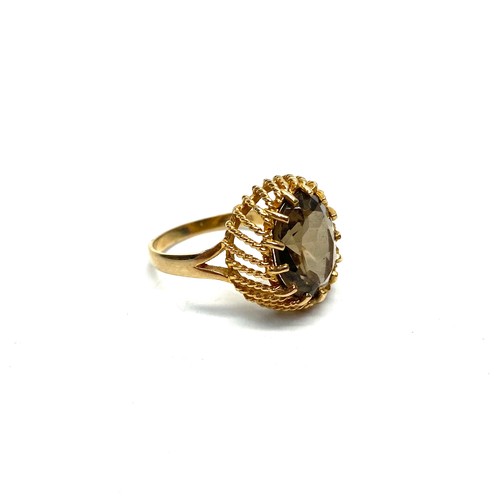 886 - 9ct gold Smokey Quartz/topaz cocktail ring.