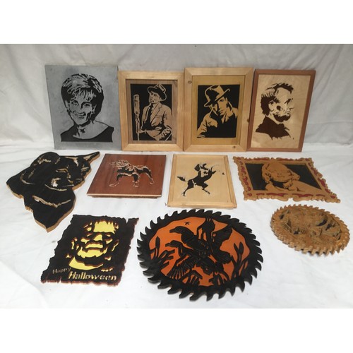 329 - A quantity of wooden scroll work silhouettes including Princess Diana, Abraham Lincoln and Humphrey ... 