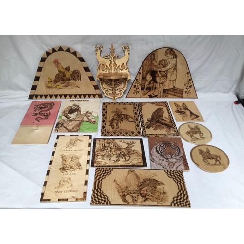 333 - A selection of scroll work and pyrography including animals and Frankie Dettori