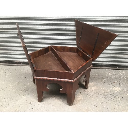 401 - Hexagon coffee table with brass inset handles, top folds out into two parts.