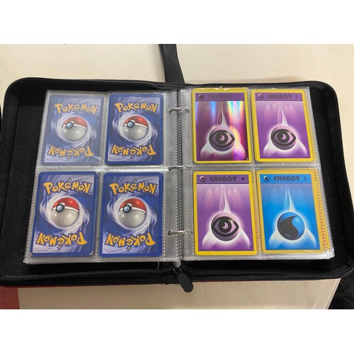 606 - Collection of pokemon cards, tins and collectors book.