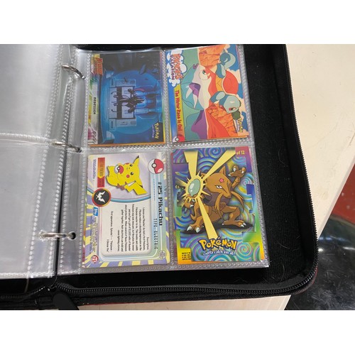 606 - Collection of pokemon cards, tins and collectors book.