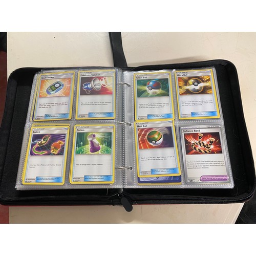 606 - Collection of pokemon cards, tins and collectors book.