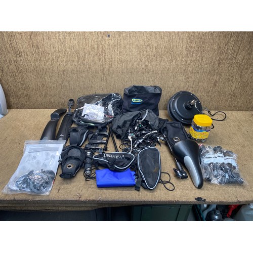 18 - selection of E bike equipment including rear wheel motor mud guards, and electrical starter kits.