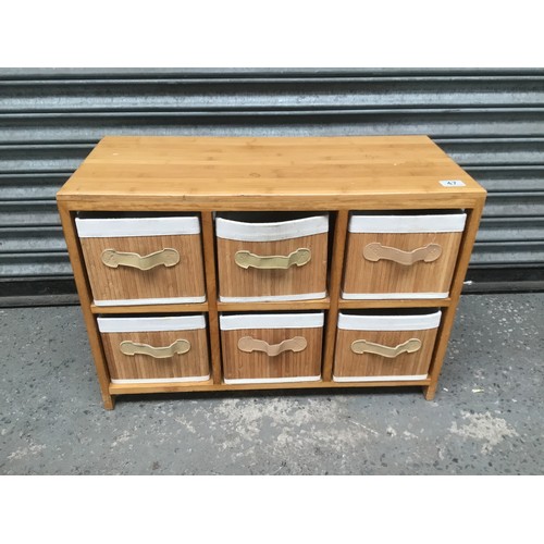 47 - Shoe rack with wooden storage boxes 70x50.