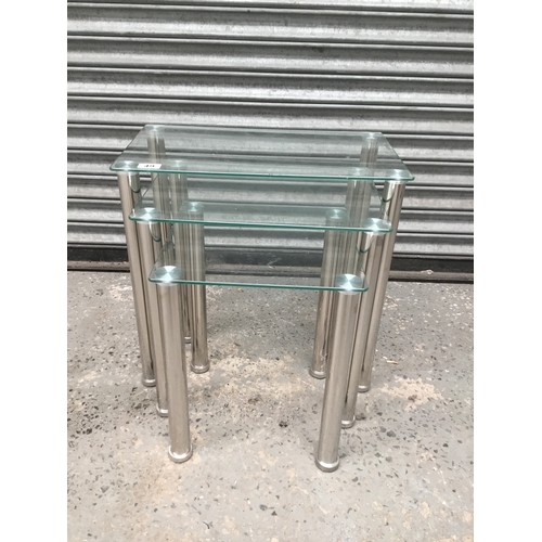 49 - Inset of glass tables and chrome.