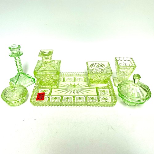 609 - Art Deco green uranium glass dressing table set.