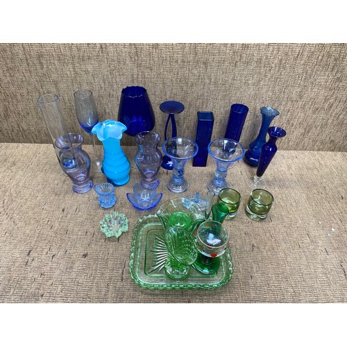 57 - Collection of blue and green glass including: Vases and glasses.