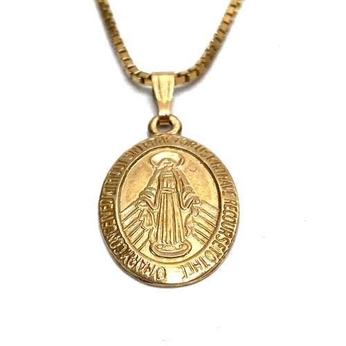 820 - 9ct gold Christian pendant and long chain. 5.3g