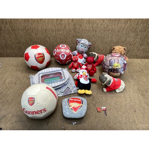 63 - Large selection of arsenal fc items including teddy bears, footballs and a cardboard making of the e... 