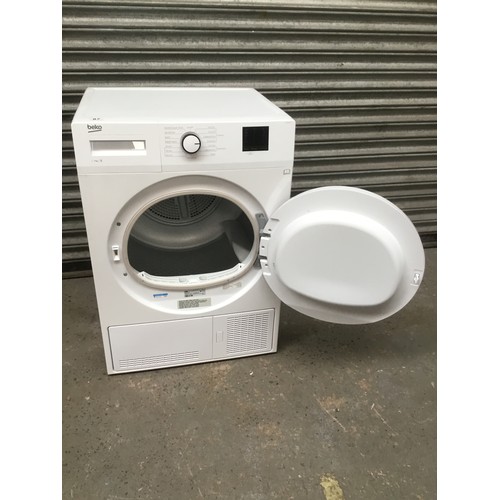 87 - Beko condenser tumble dryer model number DTBC7001W