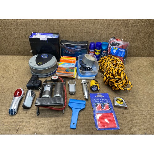 119 - Mixed items: Michelin high power tyre inflator and maps.