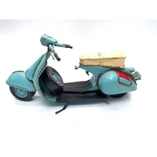 634 - Tin vespa scooter; 40cm length.