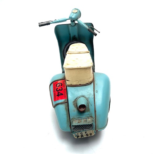 634 - Tin vespa scooter; 40cm length.