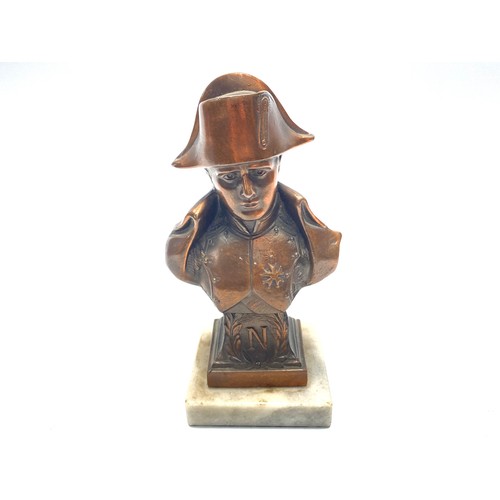 637 - Metal bust of napoleon on marble base; 16cm tall.