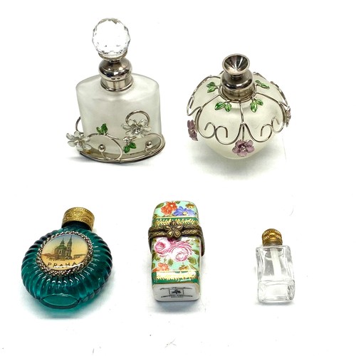 638 - 4 perfume bottles.