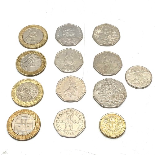 825 - UK Mint collectible £2/£1 and 50p coins.