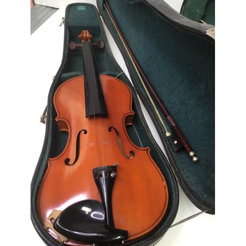 140 - Two violins with bows and cases