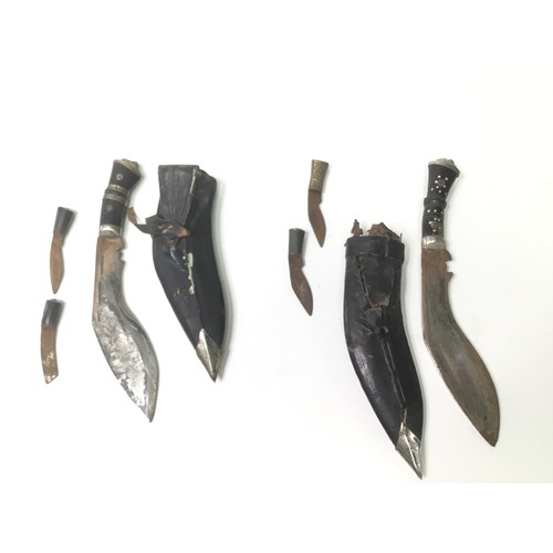 677 - Two Kukri knives in leather sheaths