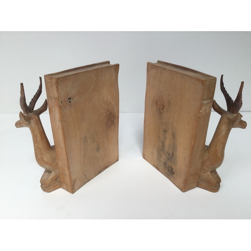 697 - A pair of antelope book ends