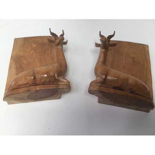 697 - A pair of antelope book ends