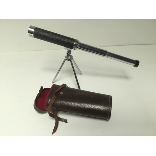 458 - Two sleeve telescope 30mm x 30mm on a tripod and in a leather case by Janik Japan