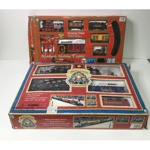 176 - Two Christmas themed train sets by Toy State