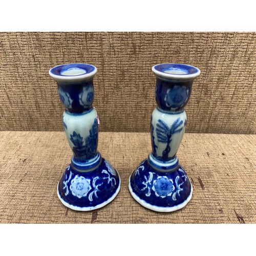 472 - A pair of vintage ceramic candlesticks