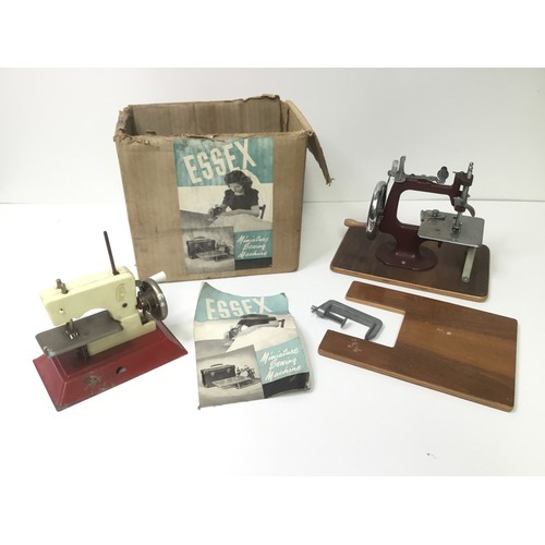 723 - Miniature sewing machine by Essex with manual and box plus another by LB