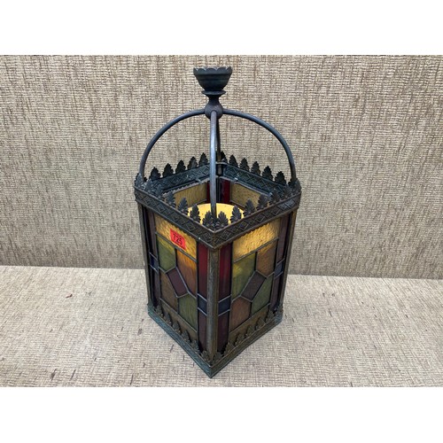 725 - Antique metal framed stained glass lantern; 54cm tall.