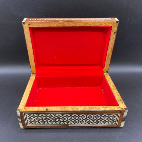 690 - Moroccan Moorish inlaid mother of pearl jewellery box and two other boxes,