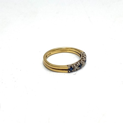 893 - 18ct gold ring with diamonds and Sapphires. 2.4g, size J.