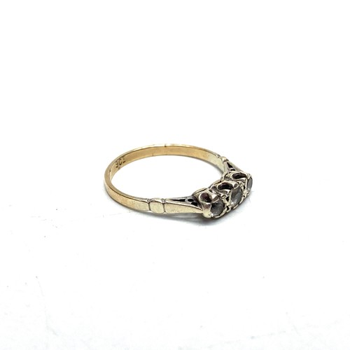 900 - 9ct gold and three diamond ring. 2.1g and Size N.