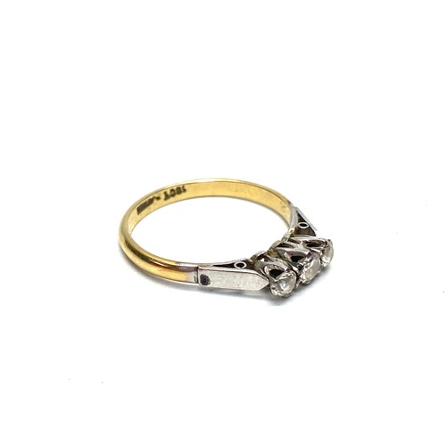 904 - 18ct gold ring with three large diamonds. 2.3g and size P.