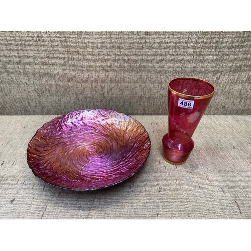 486 - Carnival glass fruit bowl and a red stained glass vase.