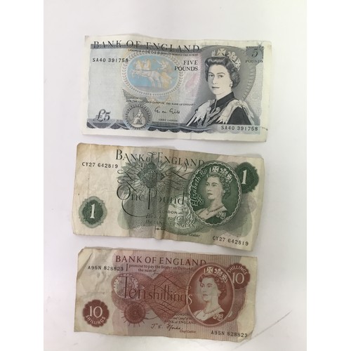 929 - Three old English banknotes including a five pound note