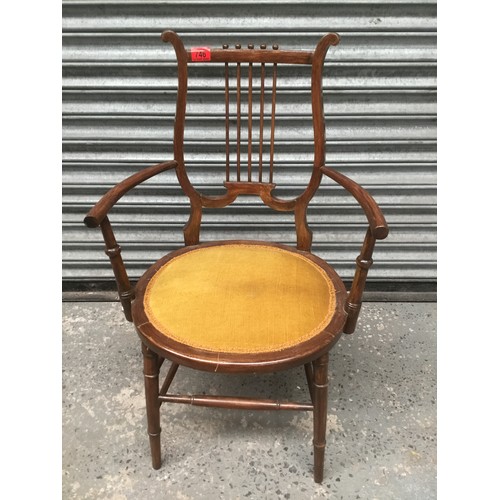 746 - Antique beech lyre back armchair