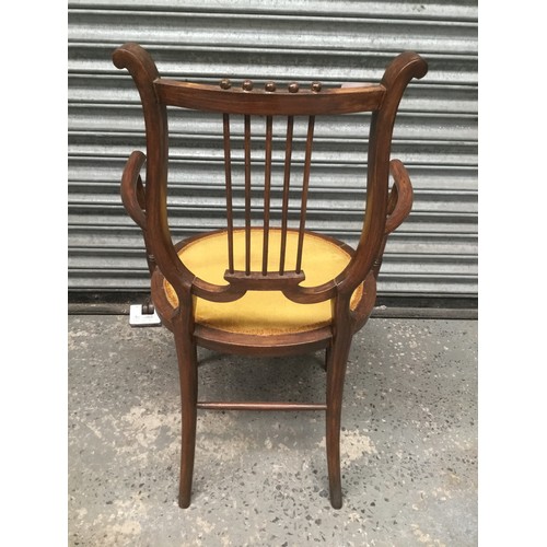 746 - Antique beech lyre back armchair