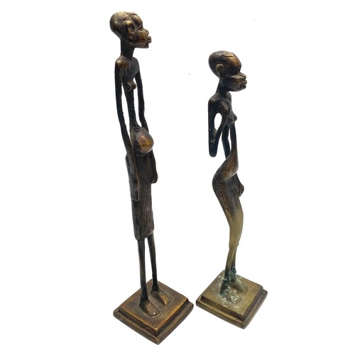 942 - African bronze elongated sculpture statue; 30cm.