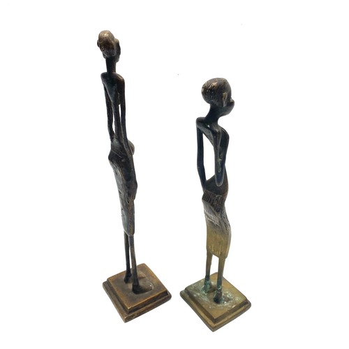 942 - African bronze elongated sculpture statue; 30cm.