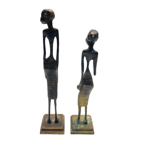 942 - African bronze elongated sculpture statue; 30cm.