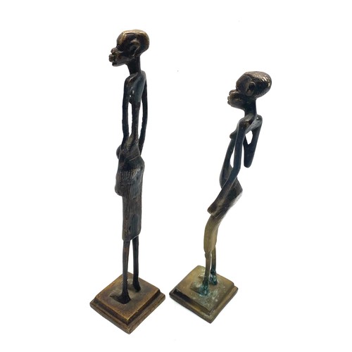 942 - African bronze elongated sculpture statue; 30cm.