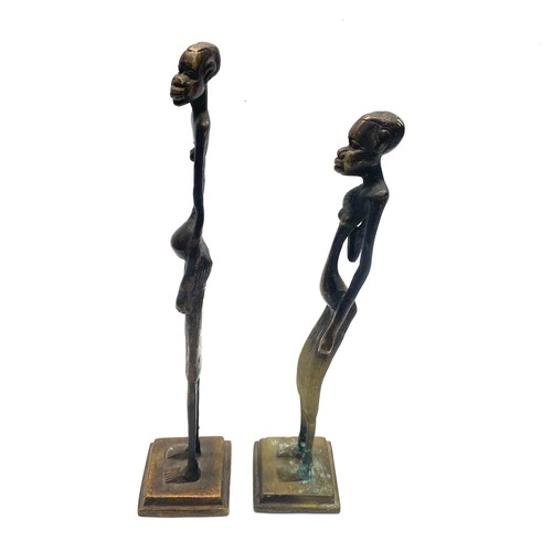 942 - African bronze elongated sculpture statue; 30cm.