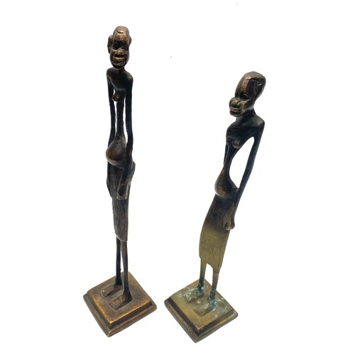 942 - African bronze elongated sculpture statue; 30cm.