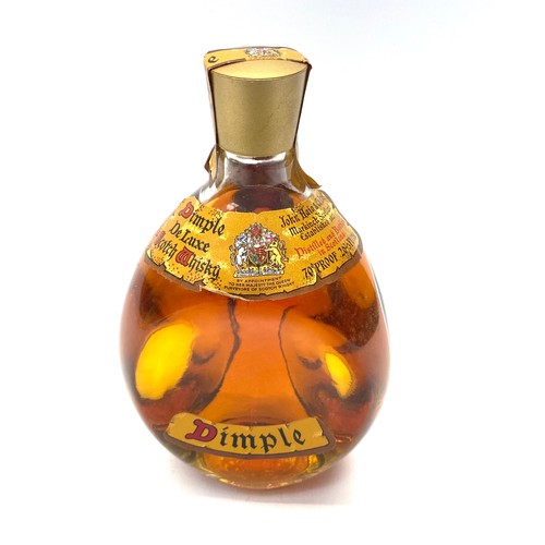 947 - Dimple deluxe scotch whisky.