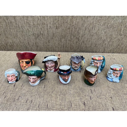 507 - Collection of character mini jugs including: Neptune, Beefeater, Gladiator and Robin Hood.