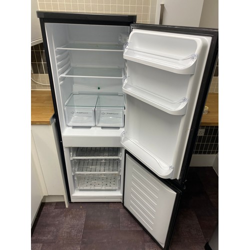 45 - Indesit fridge freezer.