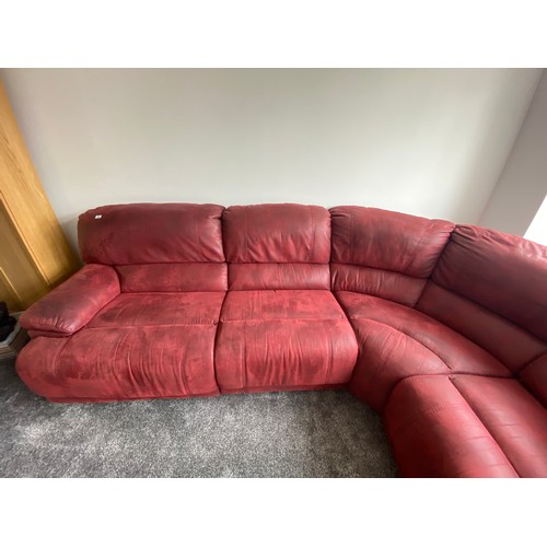 49 - Large red suede leather corner settee with recliners; 310cm long.